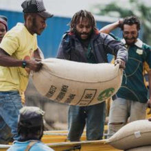 Load image into Gallery viewer, Papua New Guinea Single Origin Arabica Coffee, Medium | Specialty Roasted Coffee - Nature Source Coffee
